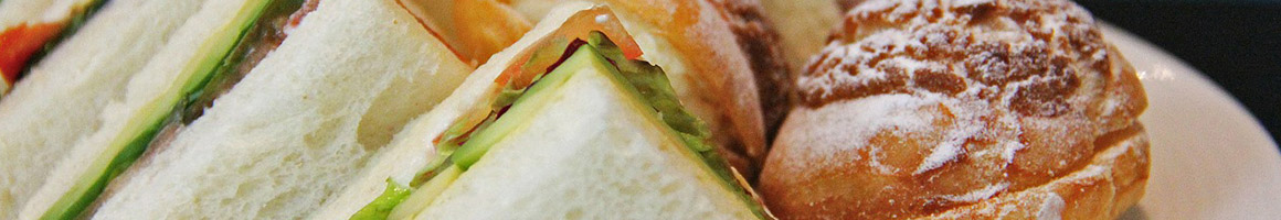 Eating Deli Sandwich at Sonoma Sourdough Sandwiches restaurant in Petaluma, CA.